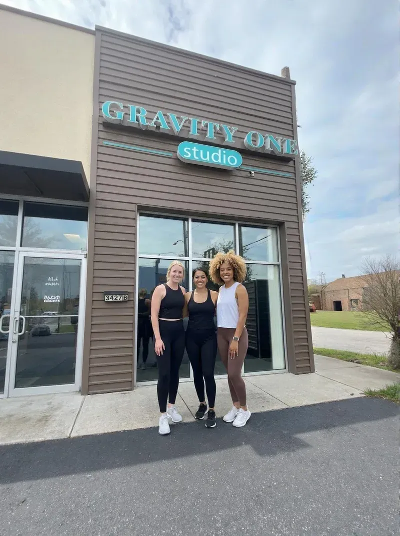 Gravity One Studio team with happy customers